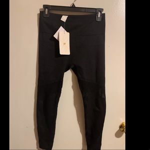 Black laser cutout leggings